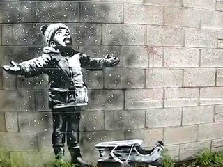 В Великобритании появилось «рождественское» граффити Бэнкси