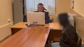 Допрос поджигателя московской квартиры сняли на видео