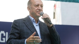 Эрдоган показал ролик про оппонентов и спел